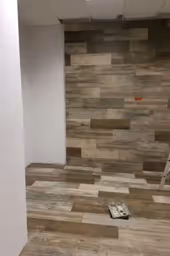 Referenzen Stade - Monderne Wandgestaltung inkl. Montage eines Wandkamins